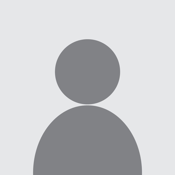 Minimalist generic profile icon featuring an overlapping solid gray circle for the head and a larger rounded shape for the shoulders and upper body, set against a light gray background. The simple design creates a clean silhouette, with grayscale tones offering a modern and universal aesthetic suitable for various digital platforms.